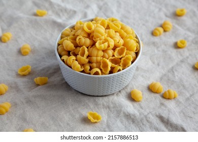 Dry Organic Gnocchi Pasta In A Bowl, Side View. 