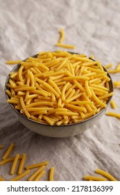 Dry Organic Maccheroni Pasta In A Bowl, Side View. 