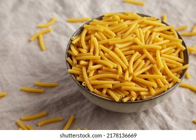 Dry Organic Maccheroni Pasta In A Bowl, Side View. 