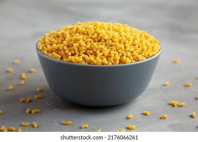 Dry Organic Pasta Coquillettes In A Bowl, Side View.