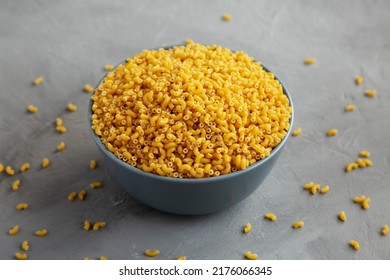 Dry Organic Pasta Coquillettes In A Bowl, Side View.