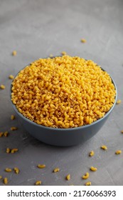 Dry Organic Pasta Coquillettes In A Bowl, Side View.