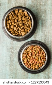 Dry Pet Food. Dry Kibble Food In Metal Bowl. Top View.