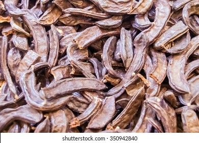 Dry Pods Of Ceratonia Siliqua, Commonly Known As The Carob Tree, St John's-bread, Or Locust Bean