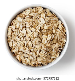 Dry Porridge Oats In White Ceramic Bowl Isolated On White From Above.