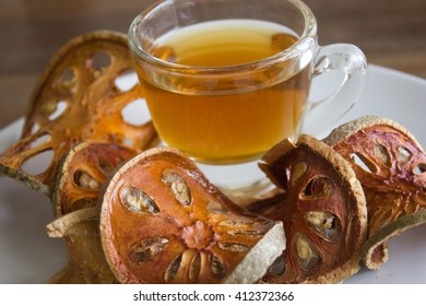 Dry Quince With Tea On The White Background