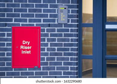 Dry riser fire safety at high rise council flats housing entrance London UK
