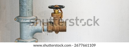 Dry riser landing valve within office building