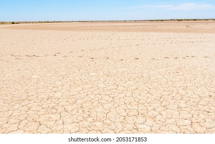 Dry river bed. Drought climate disaster - Powered by Shutterstock