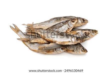 Dry roach, salted fish isolated, dried rutilus, dehydrated vobla, taranka beer snack, whole salted and dried fish, prepared roach seafood, crucian carp on white background