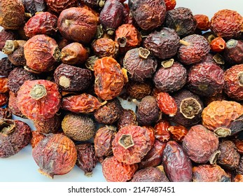 Dry Rose Hips. Pharmaceutical Raw Materials. Healing Herbs. Rosae Pseudo-fructus. Dried Medicinal Herbs Raw Materials Isolated On White. Fruit Of Crataegus Commonly Called Hawthorn, Thornapple.