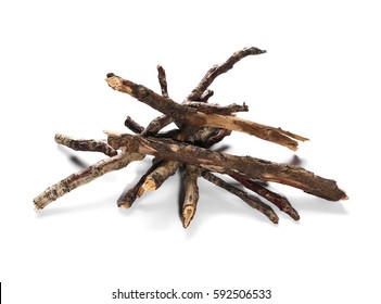 dry rotten branches pile for fire isolated on white background - Shutterstock ID 592506533
