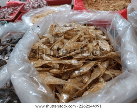 Dry salted cod fish such as kippered herring or dried and salted cod, is fish cured with dry salt and thus preserved for later eating