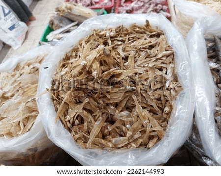 Dry salted cod fish such as kippered herring or dried and salted cod, is fish cured with dry salt and thus preserved for later eating