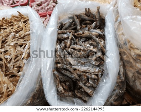 Dry salted cod fish such as kippered herring or dried and salted cod, is fish cured with dry salt and thus preserved for later eating