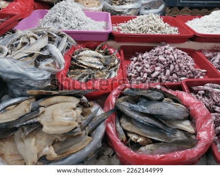 Dry salted cod fish such as kippered herring or dried and salted cod, is fish cured with dry salt and thus preserved for later eating