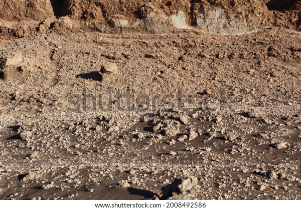Dry soil (Rocks and sand)\
at Moon valley (Valle de la Luna), San Pedro de Atacama,\
Antofagasta, Chile.