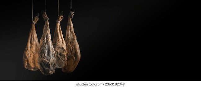 Dry Spanish ham, Jamon Serrano, Bellota, Italian Prosciutto Crudo or Parma ham.Slicing Spanish íberic ham. Spanish jamon and traditional food.