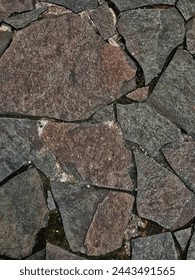 Dry Stone with Sleek Slate Pavement: Textured Roads with Red Accents