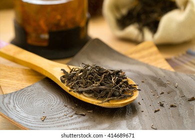 Dry Tea Puerh On A Wooden Spoon