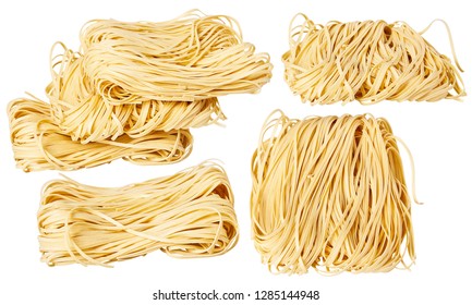 Dry thin rolled noodles square shape. Capelli d'angelo, Angel's hair - pasta.  Homemade italian pasta tagliatelle. Italian Cuisine. Egg noodles. Pasta tagliatelle nest isolated on white background - Powered by Shutterstock