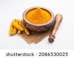 Dry Turmeric Dust or Haldi Powder also known as curcuma longa linn, selective focus