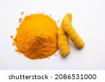 Dry Turmeric Dust or Haldi Powder also known as curcuma longa linn, selective focus