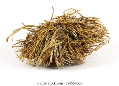 Dry valerian root (Valeriana officinalis). The drug (Valerianae radix) has long tradition as herbal medicinal product in order to relieve mild symptoms of mental stress and to aid sleep.