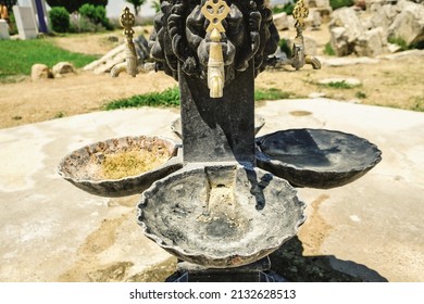 dry water fountain, antique drinking fountain without water