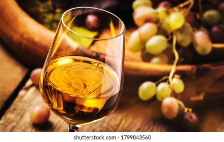 Dry white wine in glass, old-fashioned still life, banner