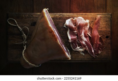 Dry-cured ham on a wooden table