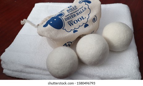 Dryer Balls On Top Of Bath Towel