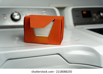 Dryer Sheets Sitting On A Washing Machine Used For Freshening Clothes And Static Removal. Also Used For Fresh Aroma And Dryer Sheet Hacks.