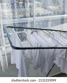 Drying Clothes On The Balcony In Sunless And Cold Weather,