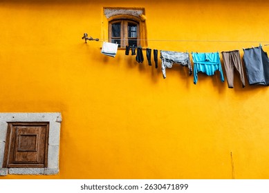 drying clothes on the wall