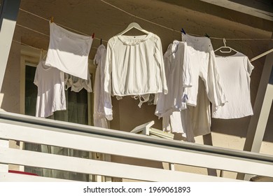 Drying Clothes At A Washing Line - Photo