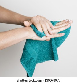 Drying Hands With A Towel