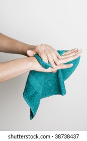 Drying Hands With A Towel