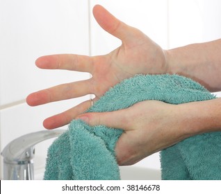 Drying Hands Using A Towel