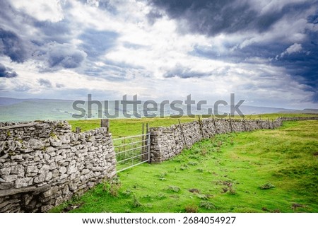 Drystone wall and a dramatic sky