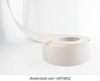 Drywall Or Sheet Rock Seam Tape On A White Reflective Background