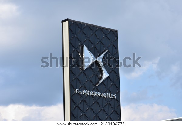 DS emblem, sign, logo on the facade of DS Store\
Warszawa car dealer salon, premium sub-brand of Citroen. WARSAW,\
POLAND - AUGUST 21, 2021