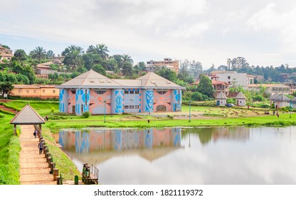Dschang, West Region/Cameroon - 09/02/2020 : Magnificent view on the munecipal lake of Dschang, with the museum of civilizations of Dschang in the background.