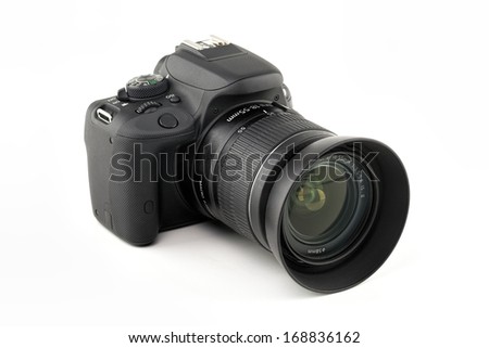 DSLR camera isolated on a white background.
