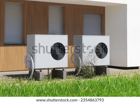 Dual Eco-Friendly Air Source Heat Pumps at Contemporary Residence