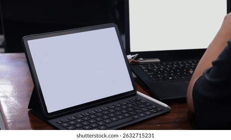 Dual screens ready for ideas to flow—where focus meets tech in a workspace driven by clarity and connection.