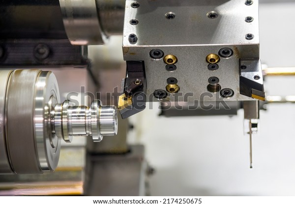 The  dual spindle type CNC lathe\
machine forming cutting the metal shaft parts. The hi-technology\
metal working processing by CNC turning machine\
.