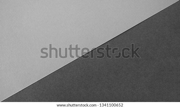 Dual tone\
black and white or grey  papers divided in center creating line\
partition as an abstract background\
space