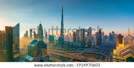 Dubai city center - amazing city skyline with luxury skyscrapers at sunrise, United Arab Emirates