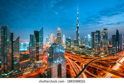 Dubai city center skyline and bussy evening after sunset with colorful sky, United Arab Emirates - Shutterstock ID 1883588026